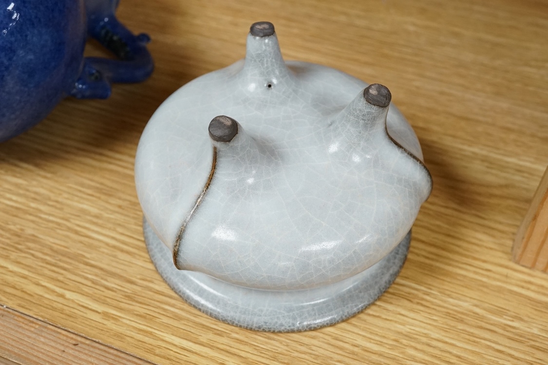 A Chinese crackle glaze tripod censer and powder blue jug, 14cm